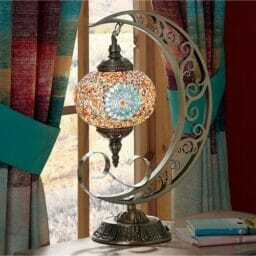 moon lamp on table in front of window