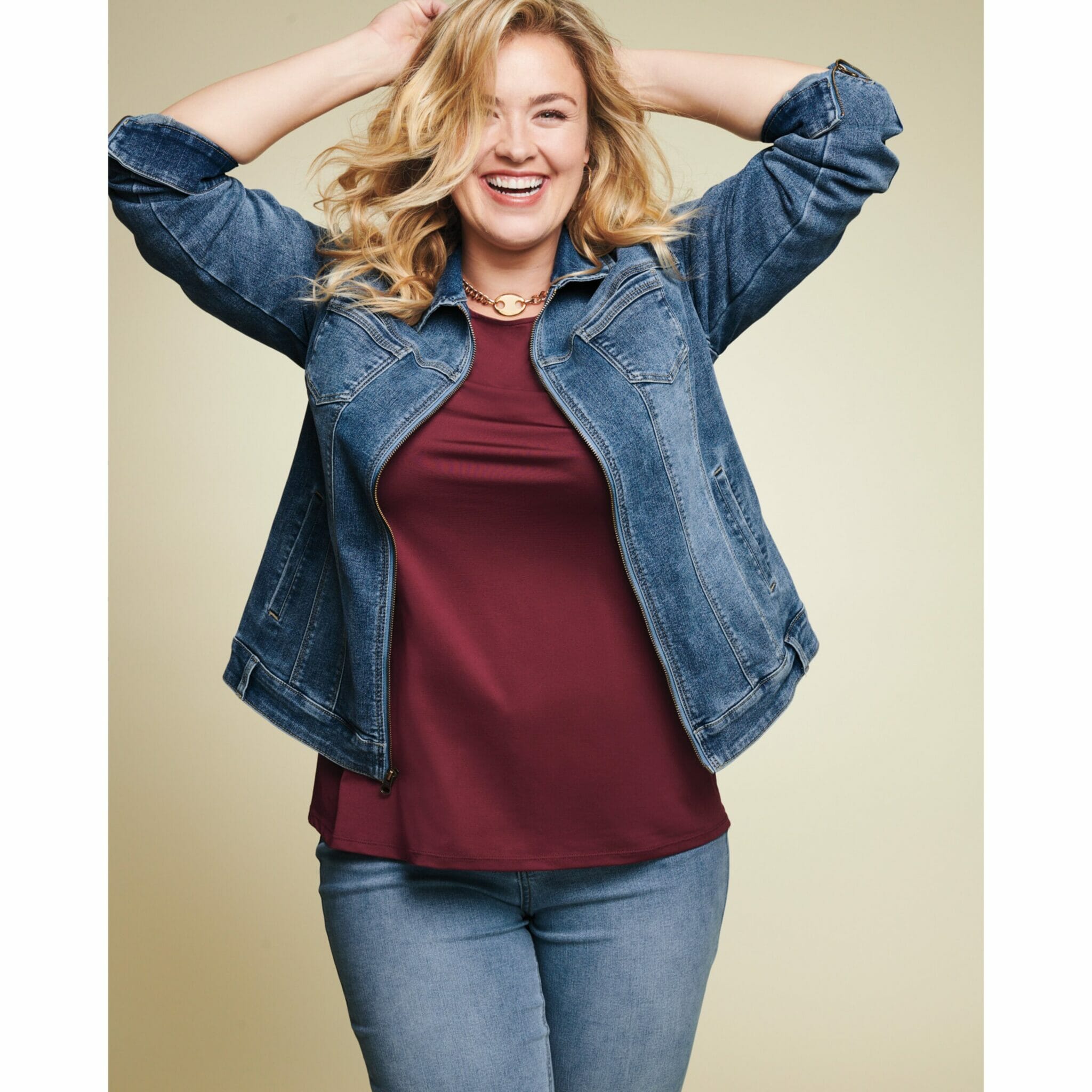 plus size woman in denim jacket