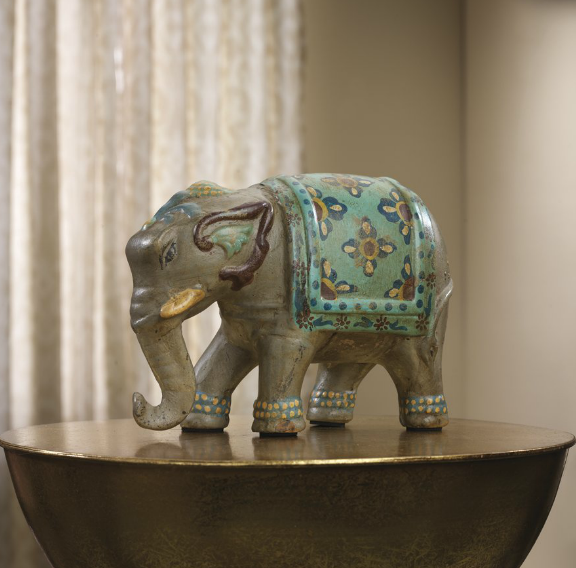 Channel your inner art-lover and add figurines or small sculptures to shelves and side tables.