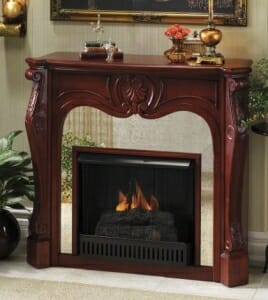 A Victorian style electric fireplace with mirror detail surrounding the firebox with faux burning logs.