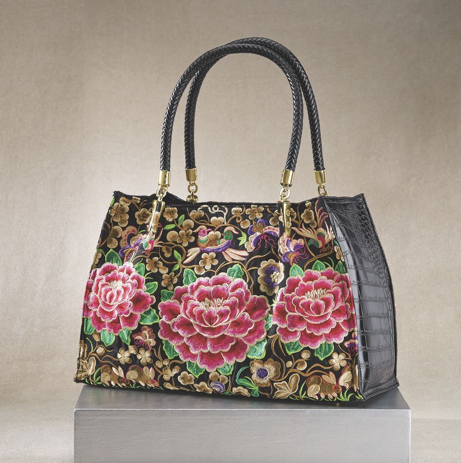 a new fall-inspired handbag will help transition your wardrobe from summer to fall 