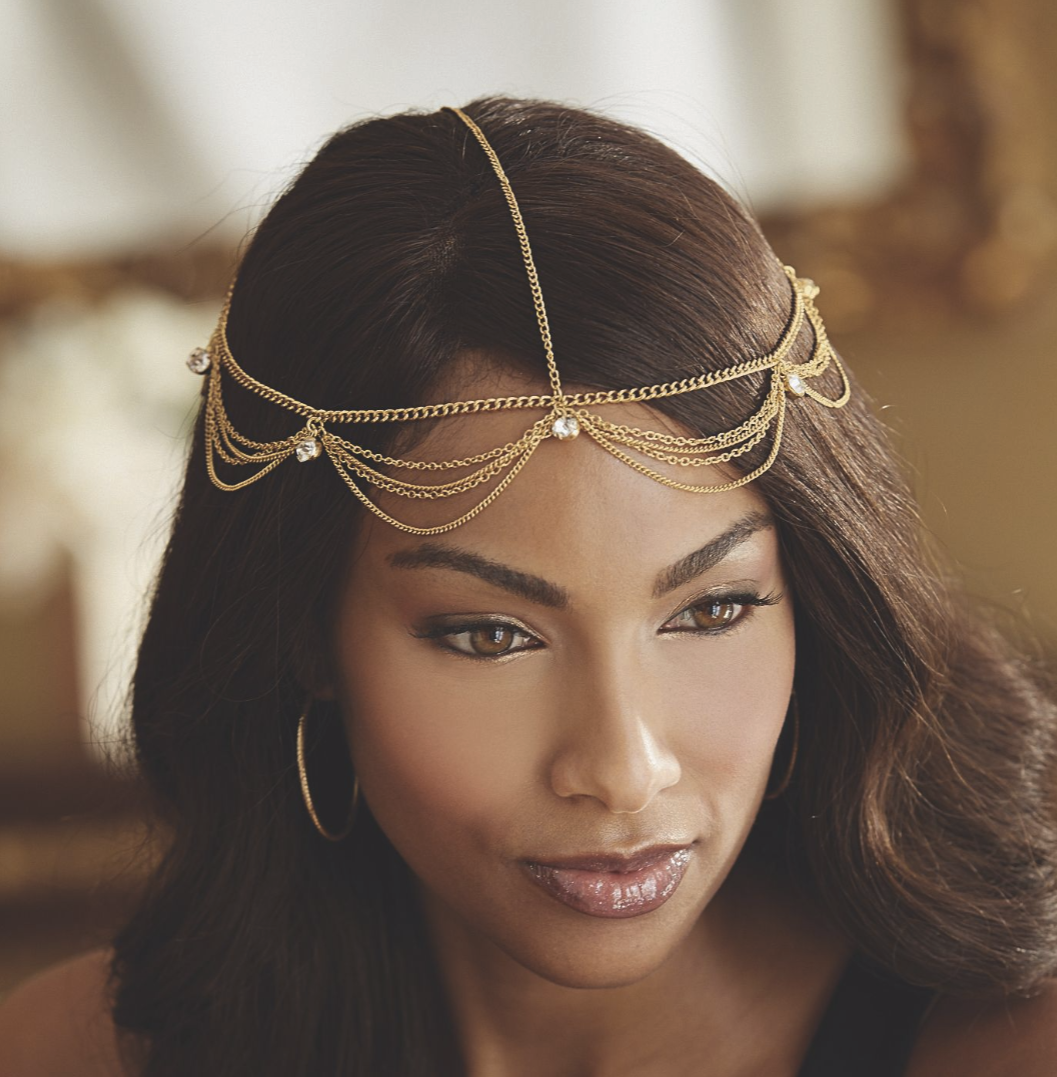 woman wearing head jewelry