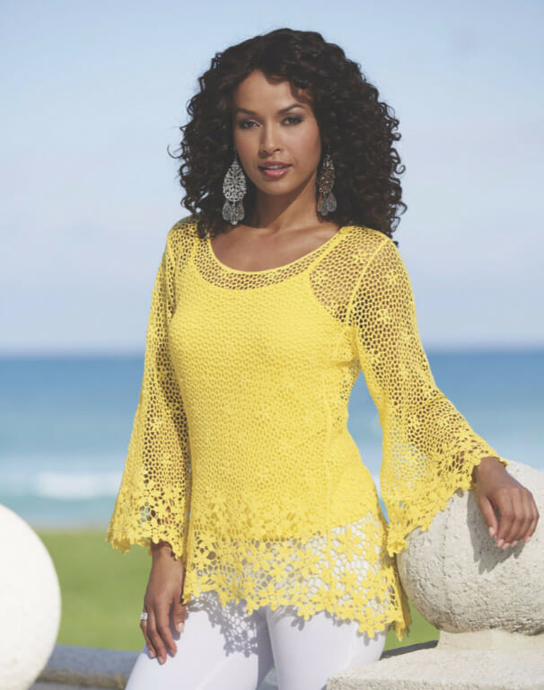 woman wearing a bright yellow sweater