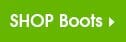 SHOP Boots, white text on a green background, with an arrow to link to another page.