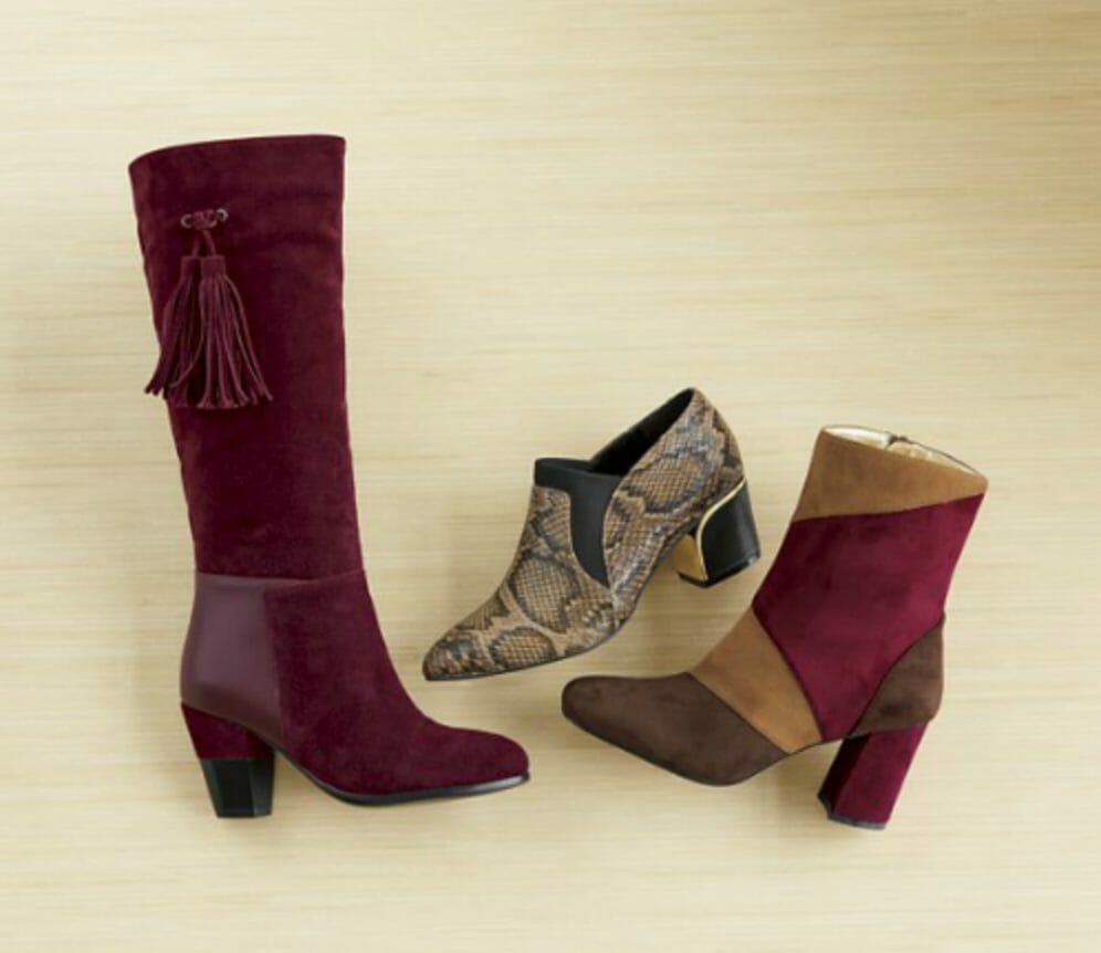A tall merlot faux suede boot, a brown and black faux snakeskin shootie, and a faux suede bootie in brown, tan and merlot.