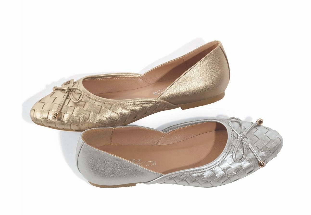 Two flat slip-on shoes with woven fronts and a tied bow, one in gold and one in silver.
