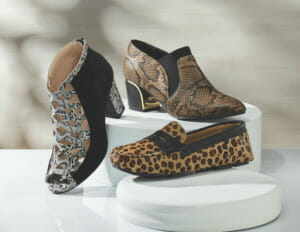 Three faux animal skin shoes, a cheetah loafer, a black and brown snakeskin shootie, and a black and white cutout bootie.