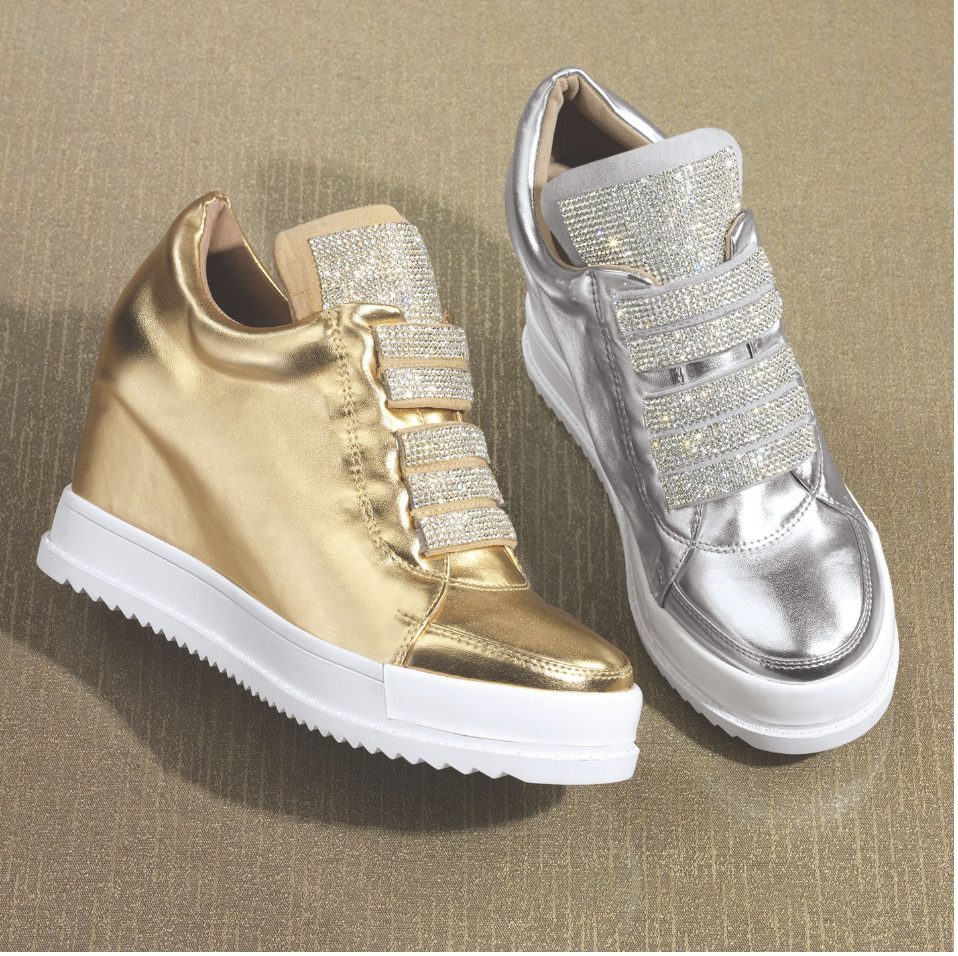 Two bling high-top tennis shoes with rhinestone fronts, one in gold and one in silver.