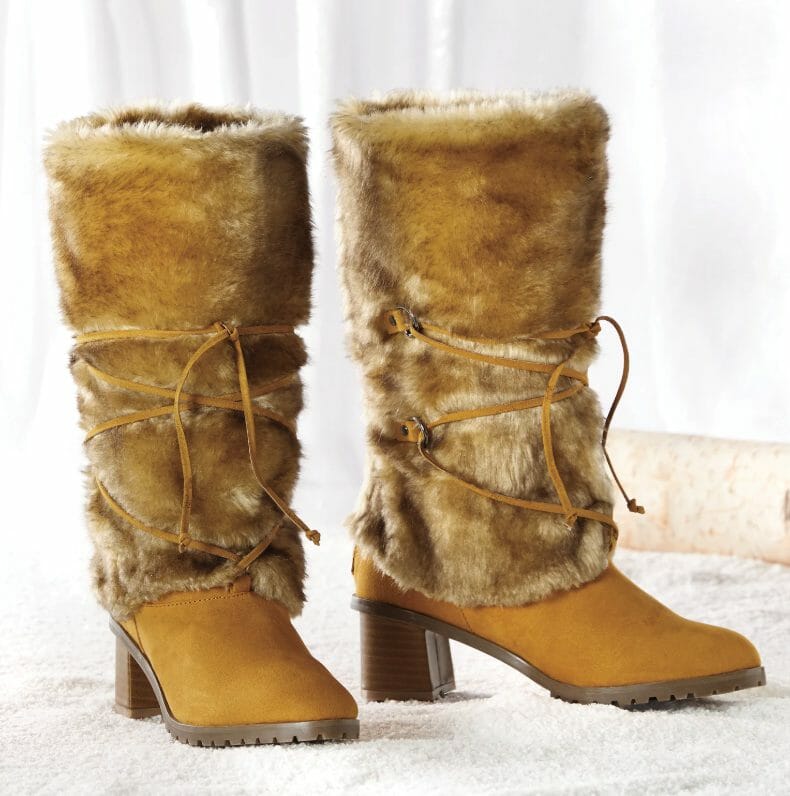 Faux fur-wrapped tall mustard boot with faux suede upper and laces, with a chunky wood look heel.